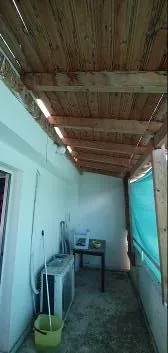 The enclosed balcony before