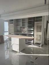 Kitchen units being installed